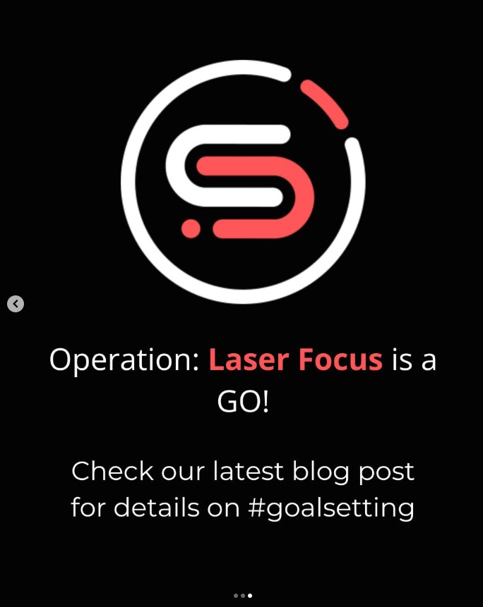 Carousel frame three: Operation: Laser Focus is a GO! The ring-S logomark on black, pointing to the latest blog post on goal setting